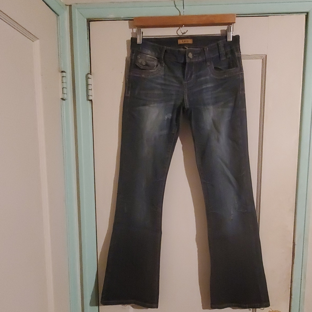 Slightly distressed bootcut jeans